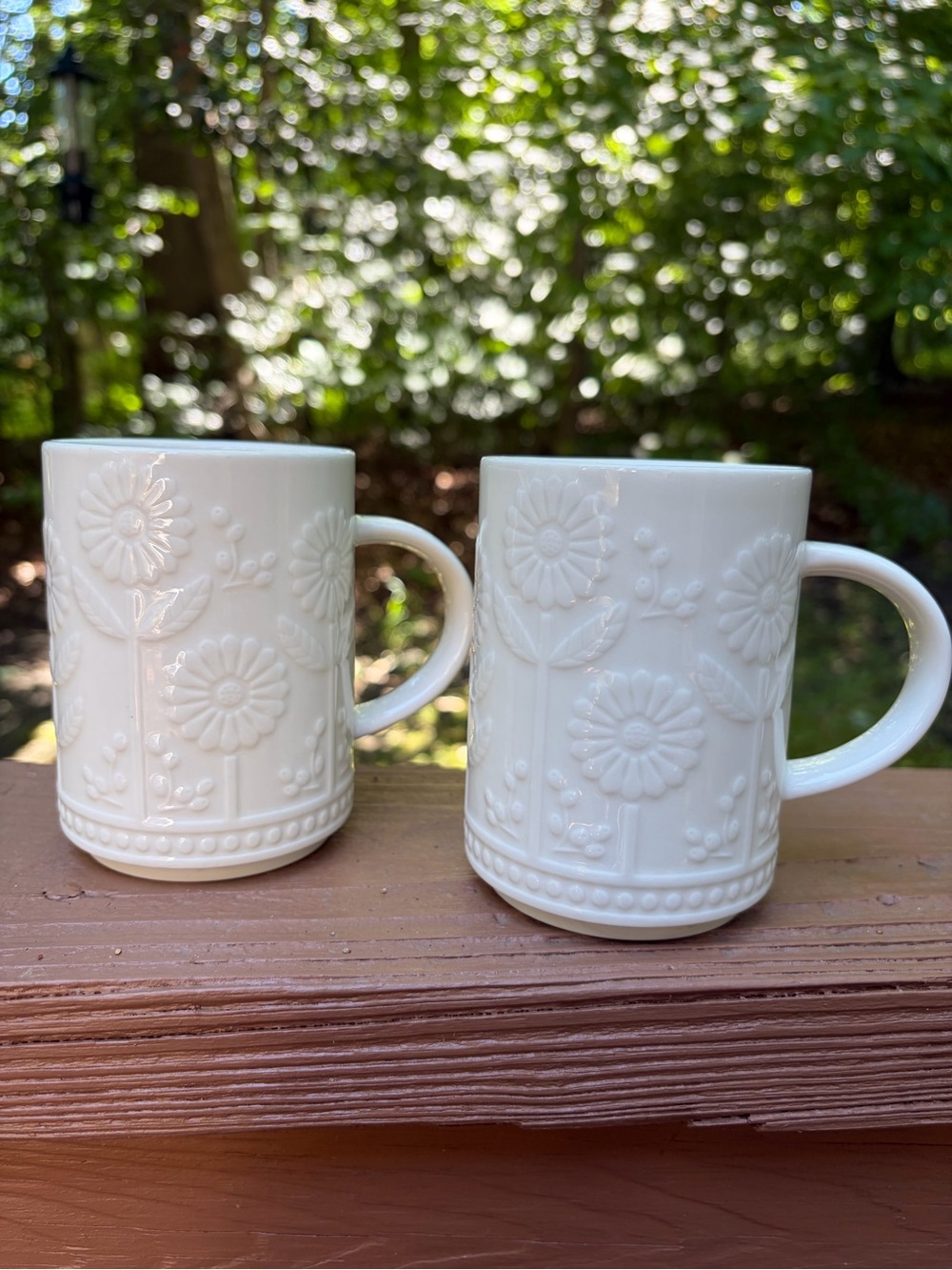 Two Starbucks 12 oz ceramic mugs with embossed daisy or sunflower floral design - Picture 10 of 14